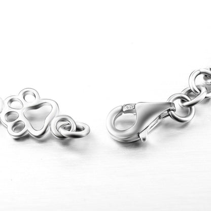 Aurembiaix™ | Paw Print and Bone Charm Bracelet in Silver